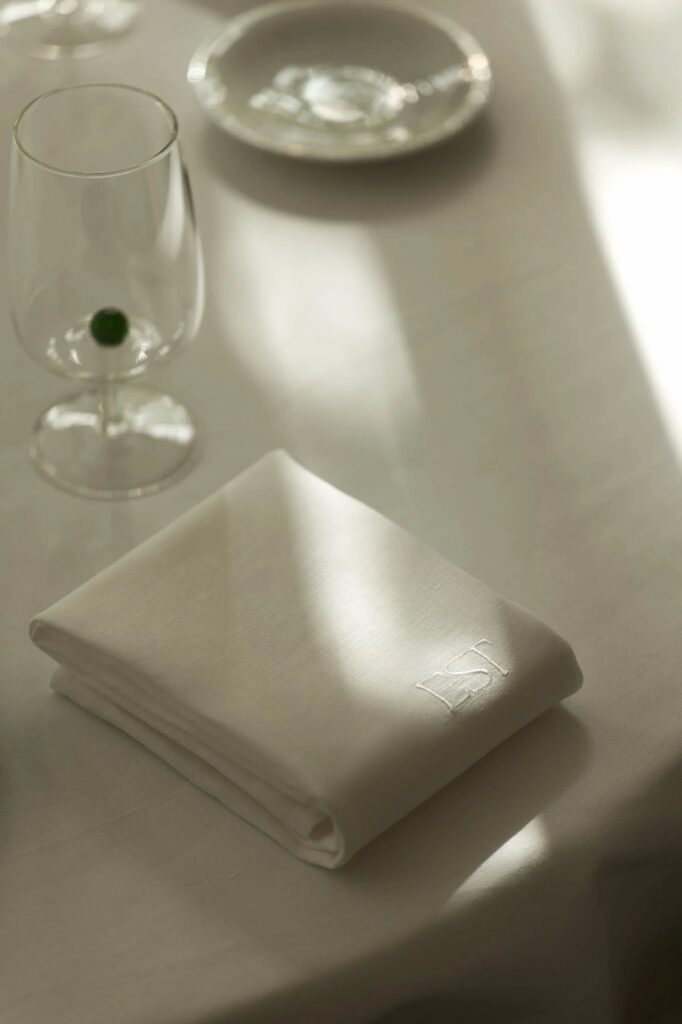 Table set with napkin and glass