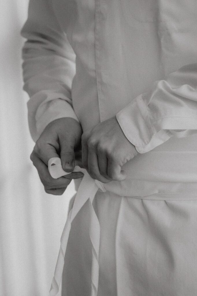 Hands folding a napkin